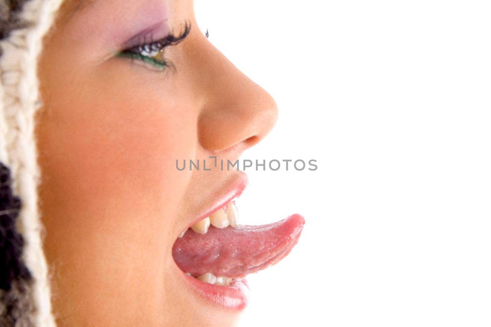 pretty girl teasing someone with tongue with white background