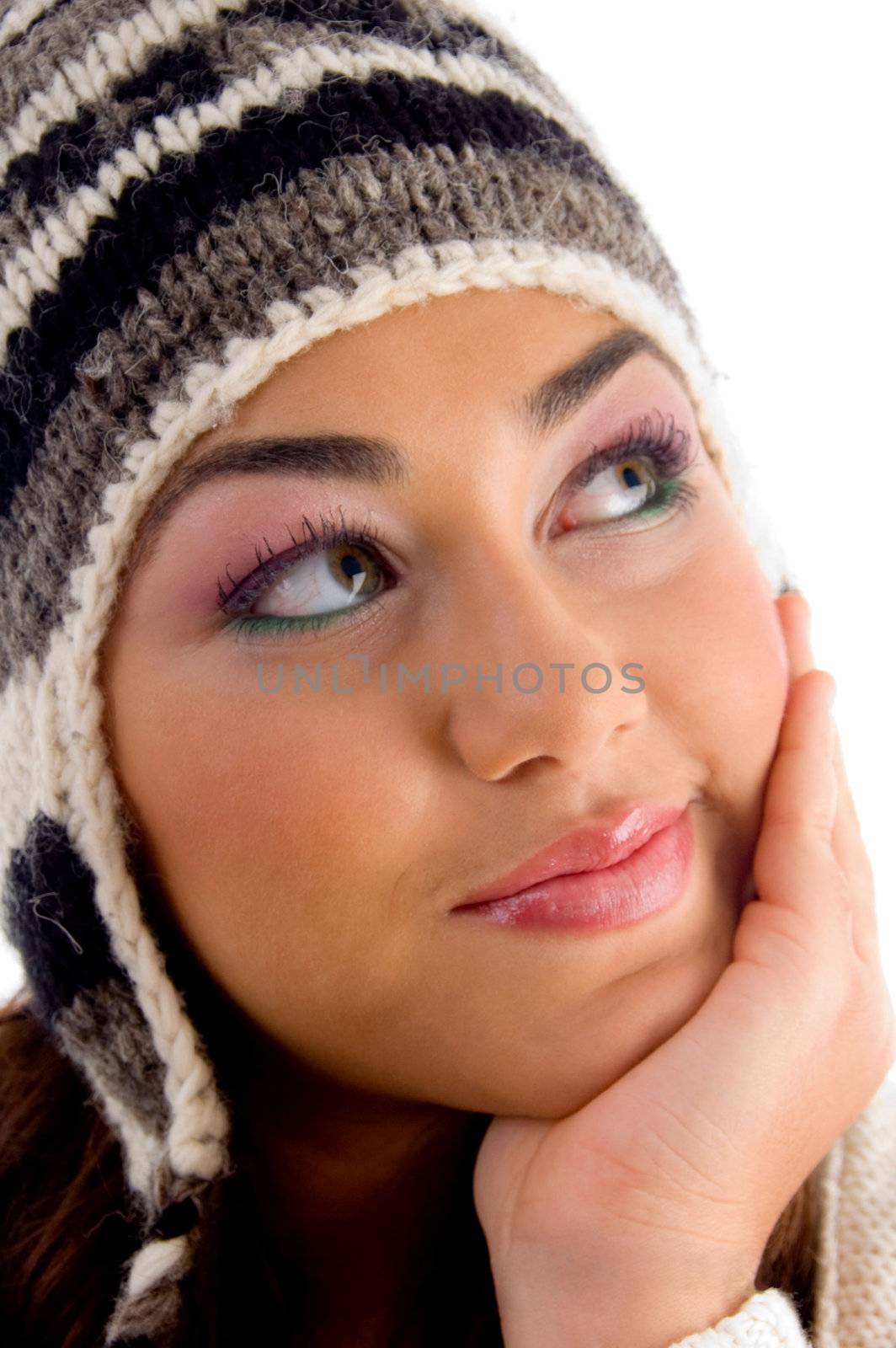young girl posing with facial expressions against white background