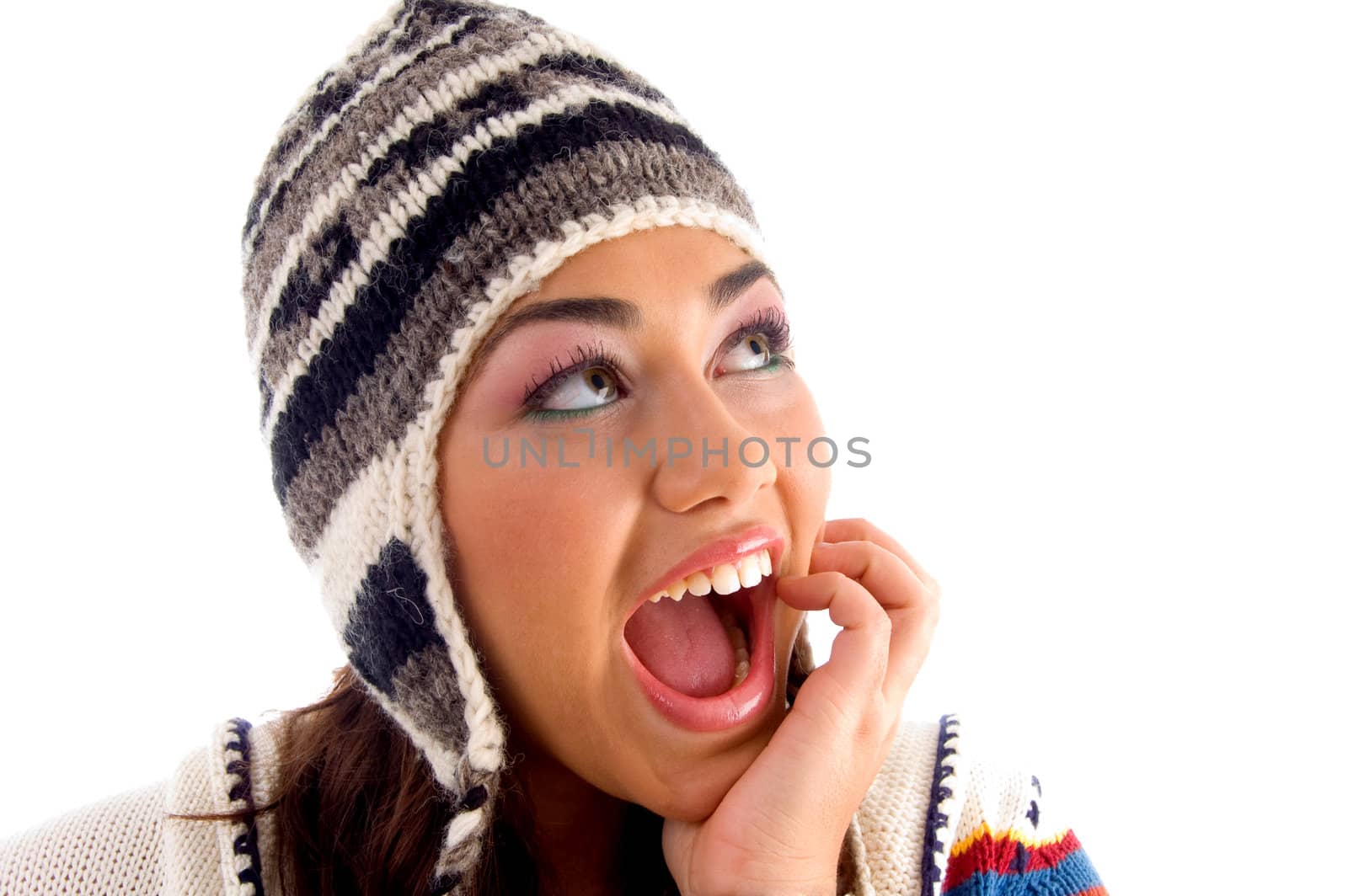 beautiful face of woman wearing cap on an isolated white background