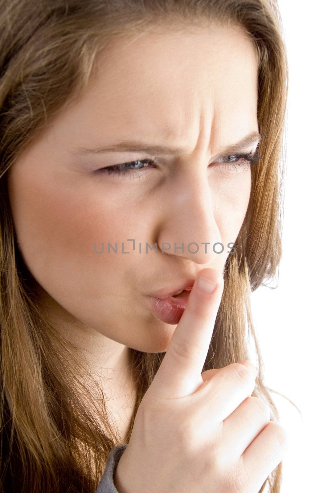 teen female  face showing keep shushing sign  on an isolated background