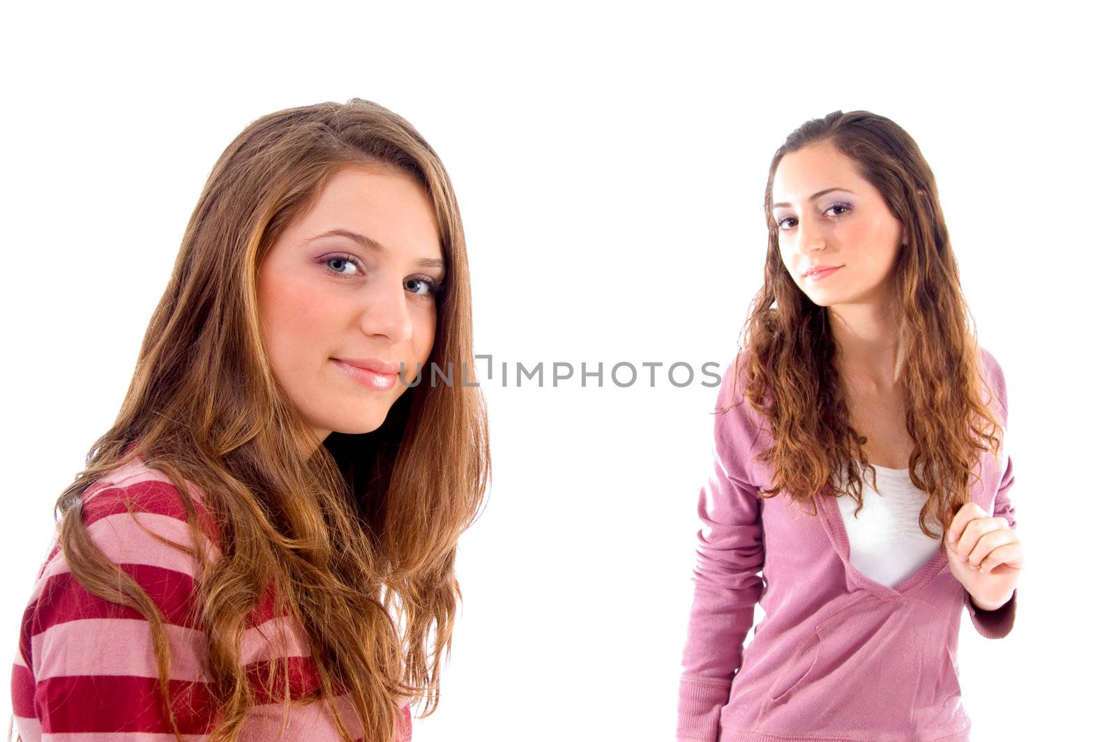 beautiful girls standing in front of camera against white background