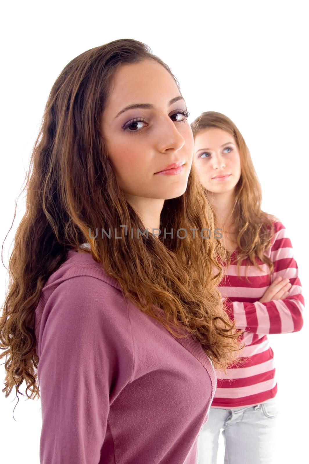 pleased two girls posing with white background