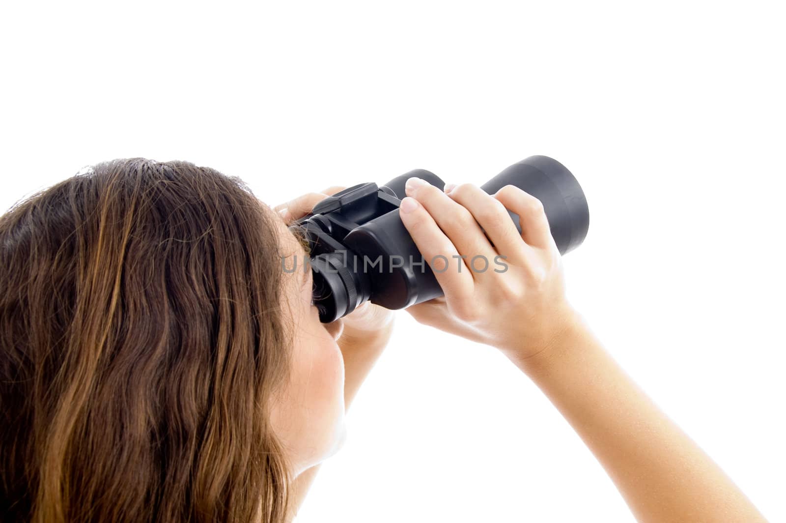 female watching through binocular against white background