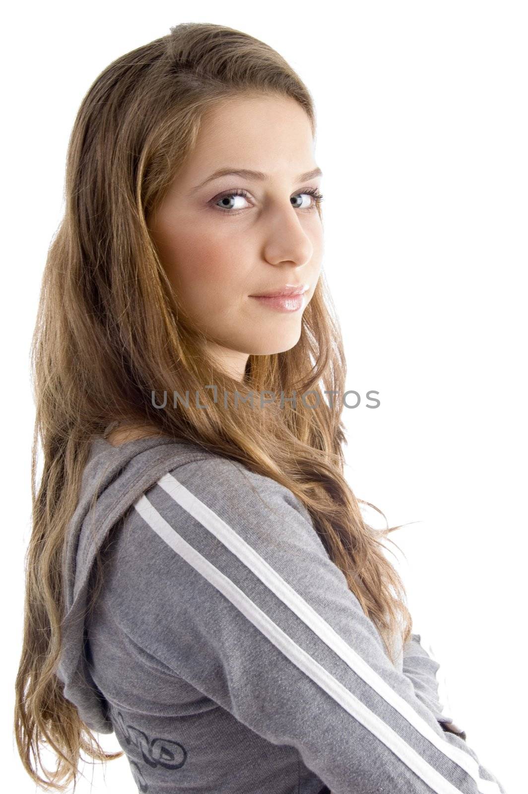 side pose of female looking at camera on an isolated white background