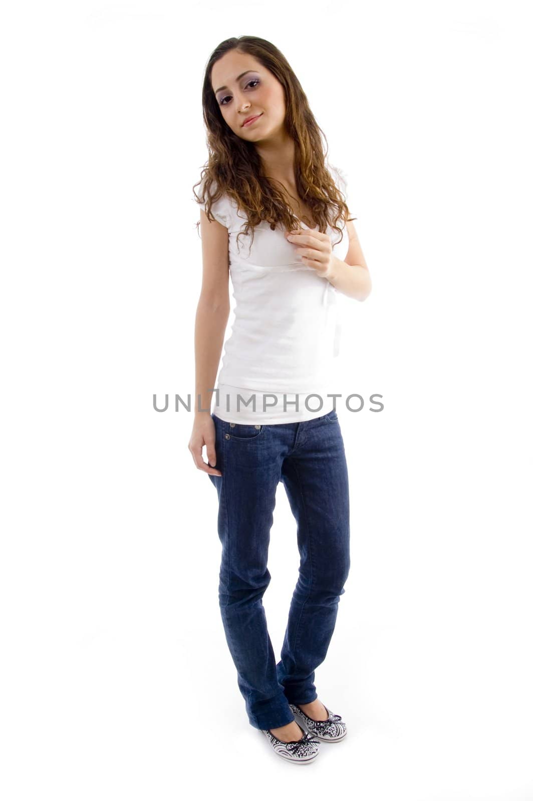 standing female looking at camera against white background