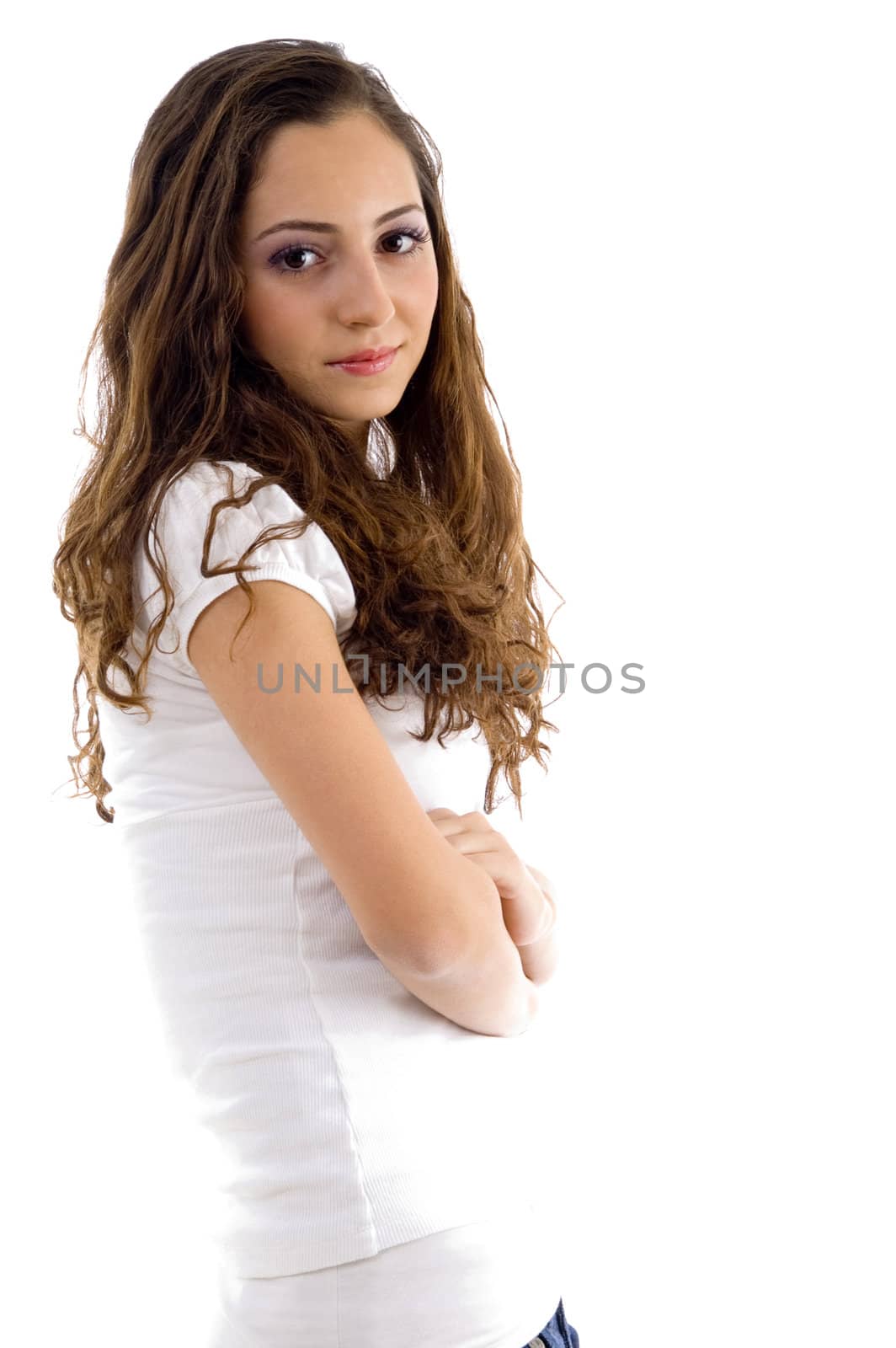 folded arm female looking at camera with white background