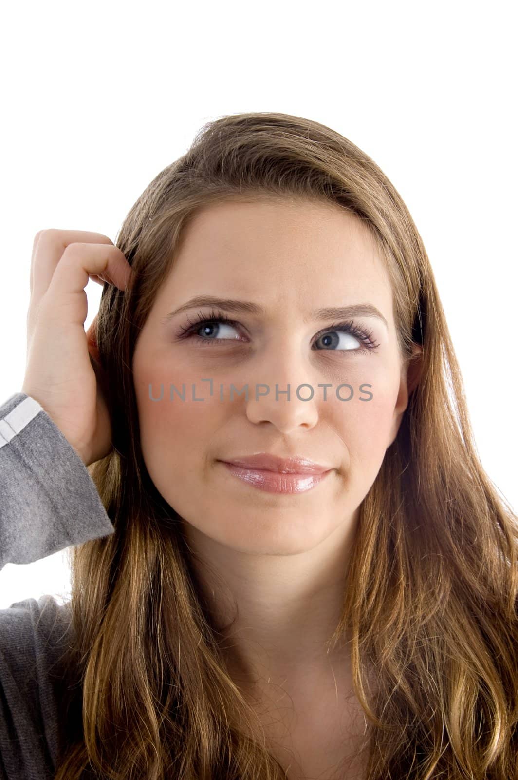 female scratching her head with white background