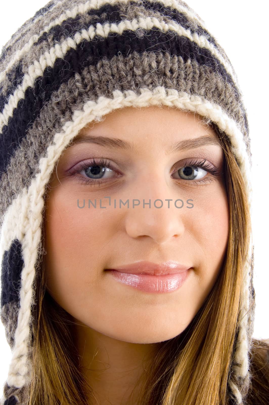 close up of beautiful female looking at camera on an isolated white background