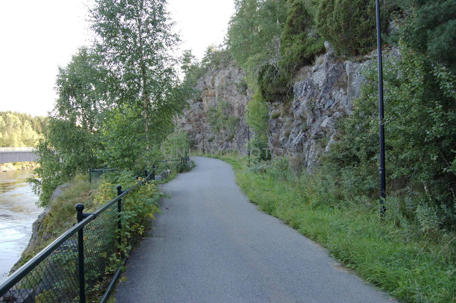 Turist road leading to the old fossum brigde, crossing the river Glomma. Norway