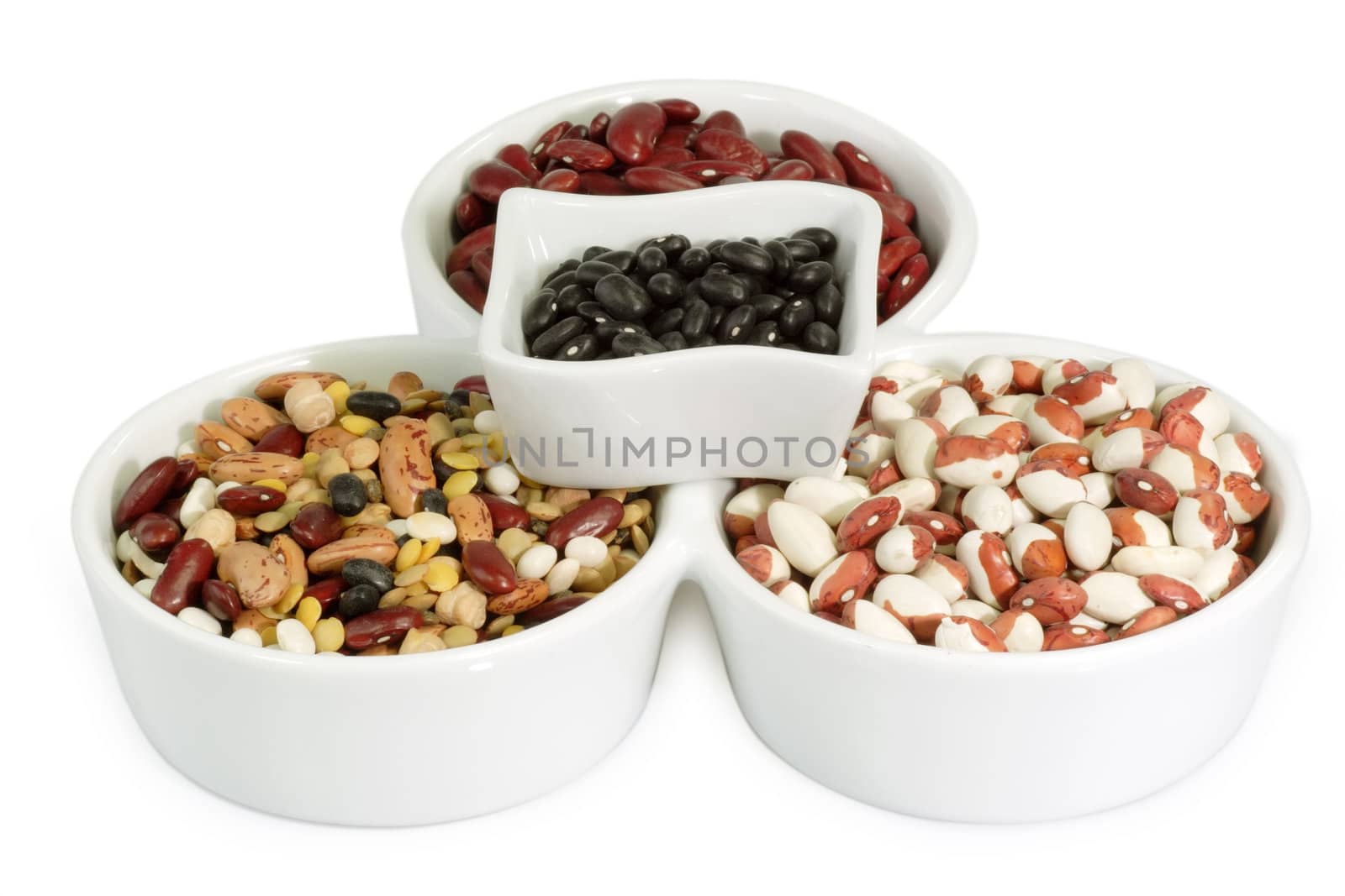 Mixed colorful beans in a white bowl
