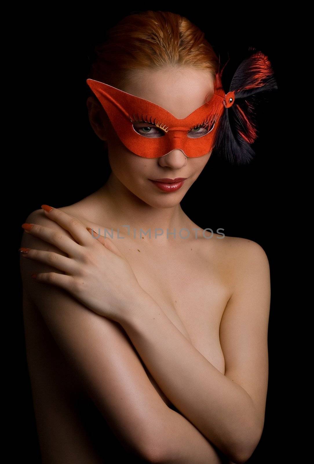 Topless female in red mask