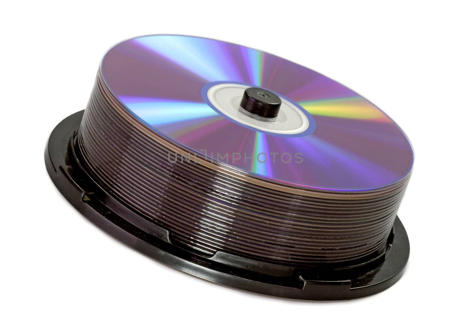Shiny DVDs on a spindle on white Background