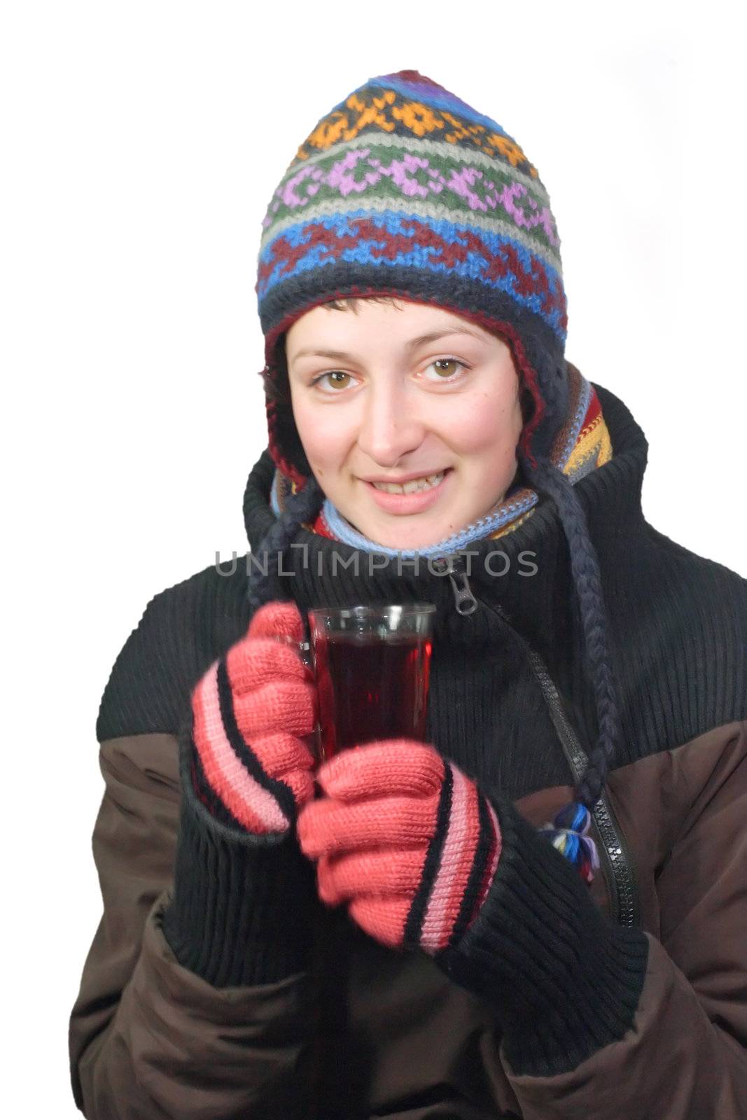 Young woman drinking tea. On white.
