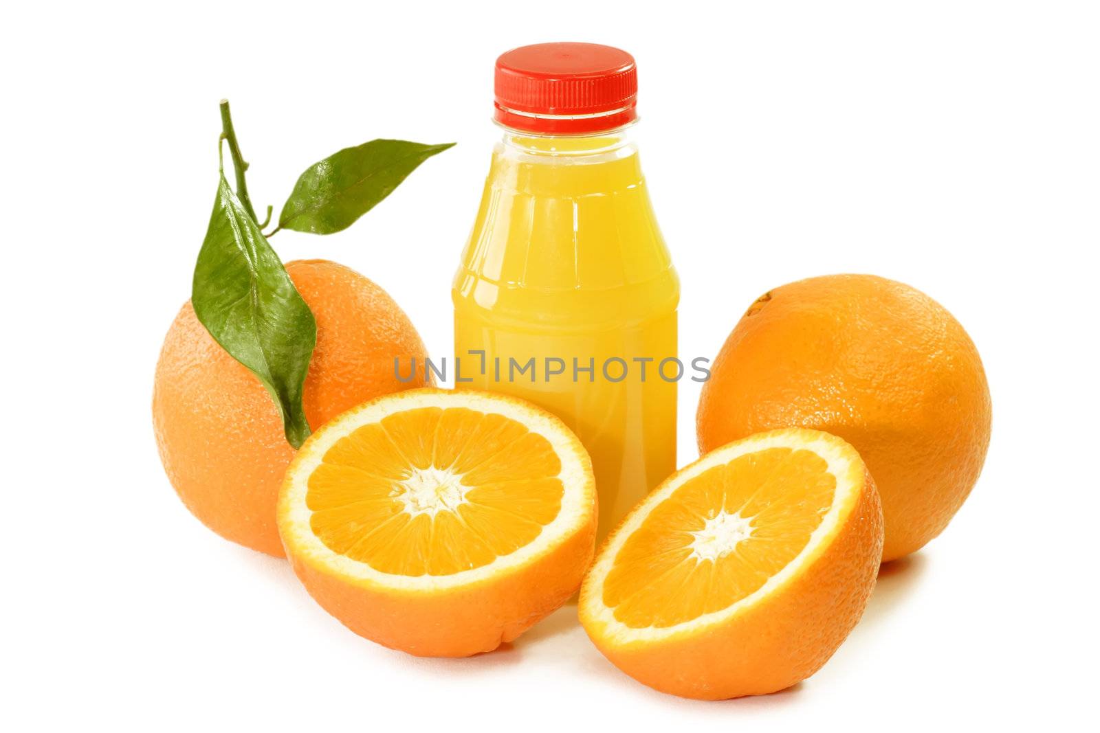 Fresh Orange with Orange Juice in the bottle on bright background. 