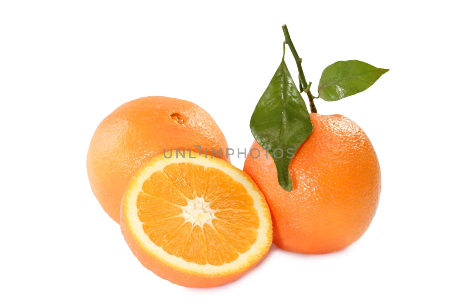 Orange with leaf, studio on bright background
