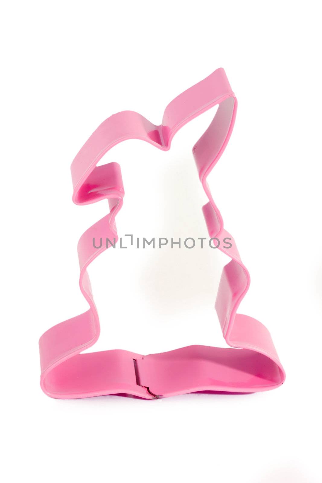 Pink easter bisquit cutter on bright background