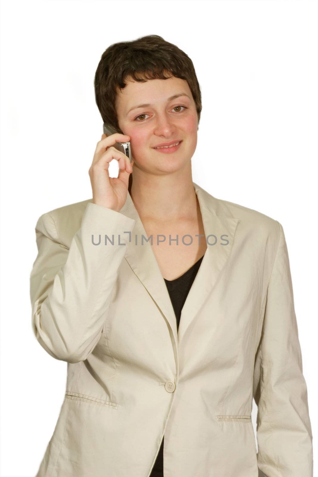 Young woman calling on a cellphone - isolated on white background