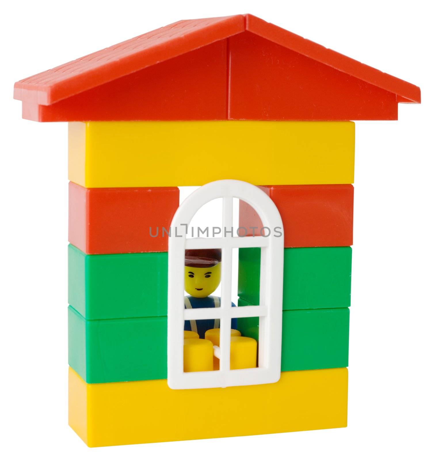 Little man and toy house on the white background