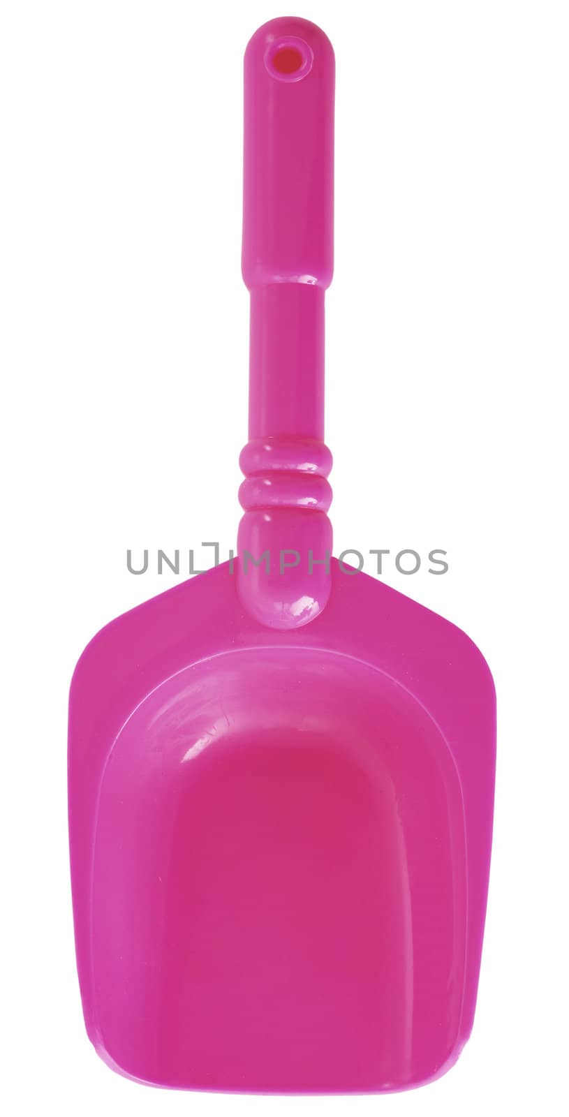 Toy plastic pink shovel on the white background