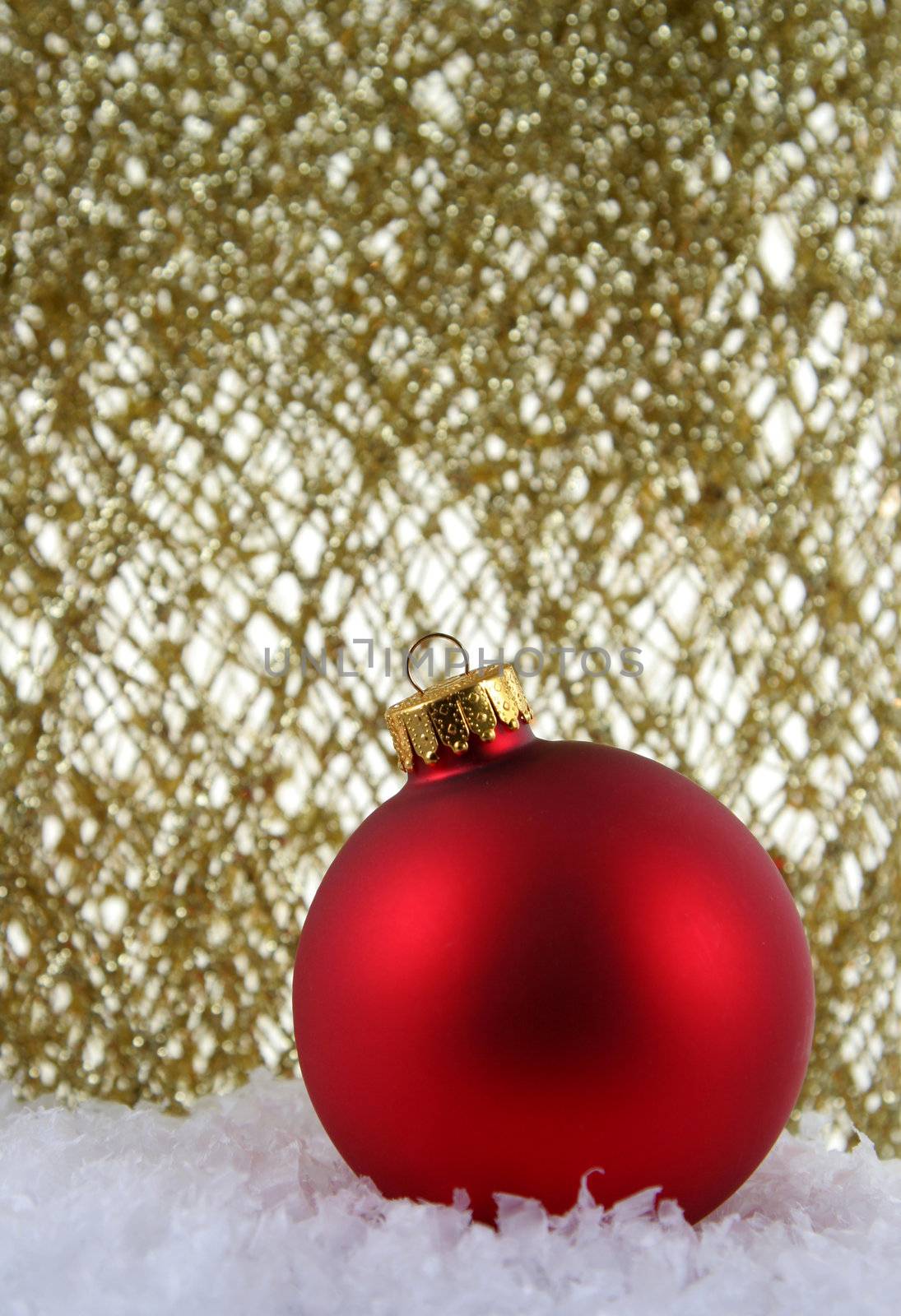 Red Bauble against Gold Glitter
 by ca2hill
