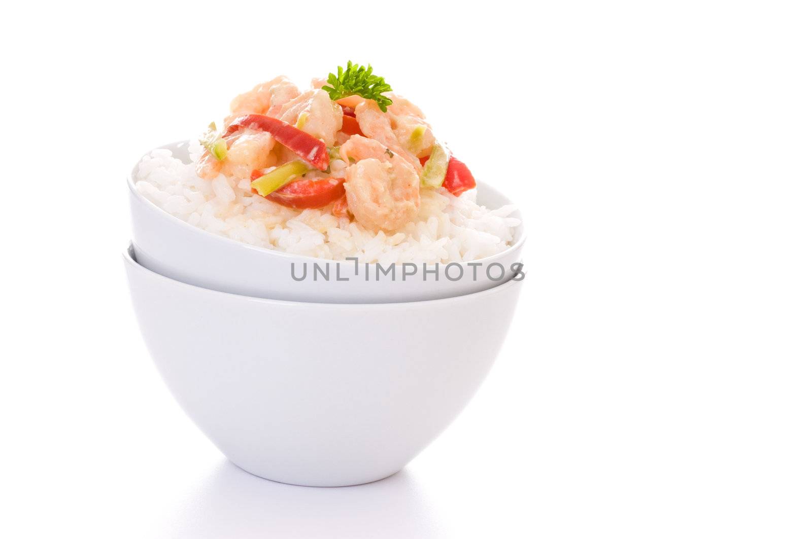 Thai green curry shrimp served with white rice.