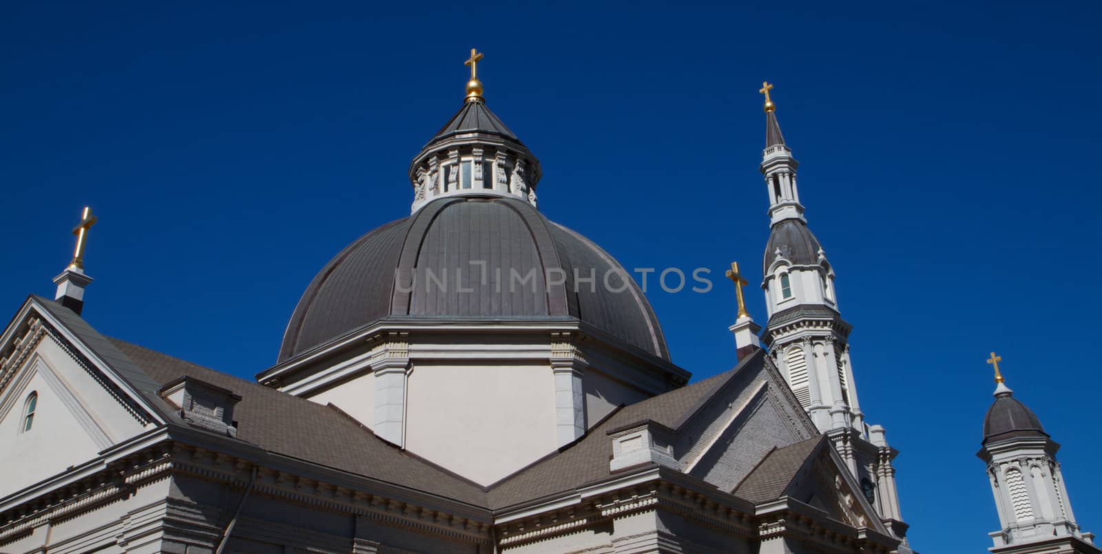Five Gold Crosses of Cathedral with deep blue sky