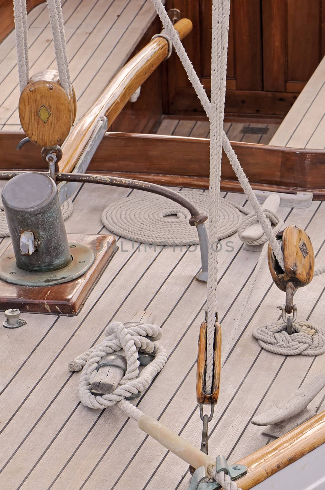 Detail of an old-fashioned sailboat with many tools and ropes