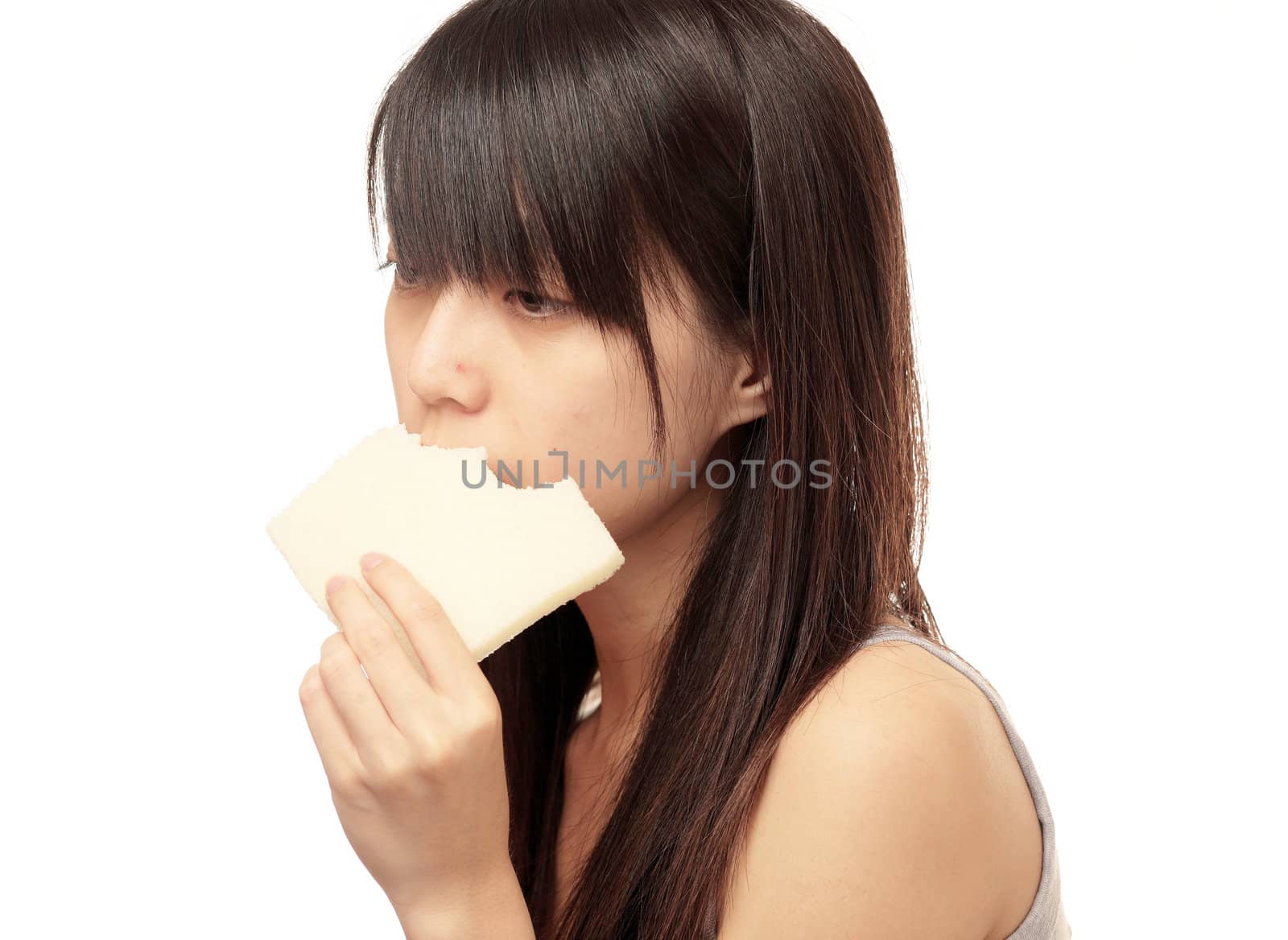 chinese girl look sad and eat bread