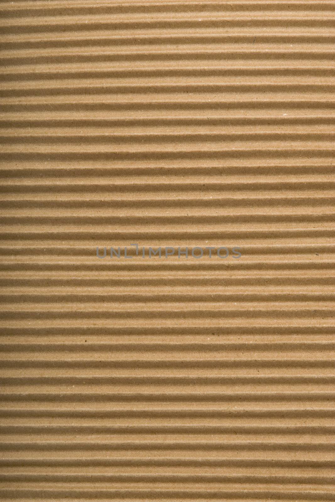 brown corrugated cardboard texture, striped horizontally paper