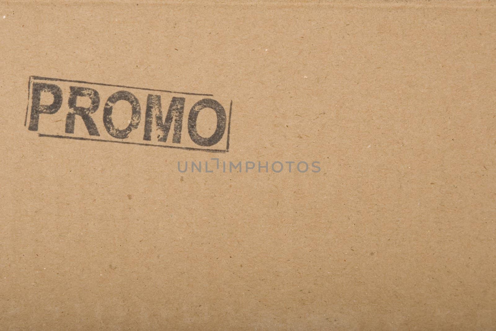 promo message, copy-space on brown cardboard texture