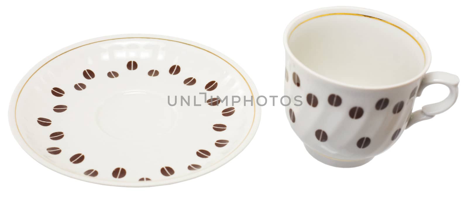 Cup and saucer from coffee set on the white background