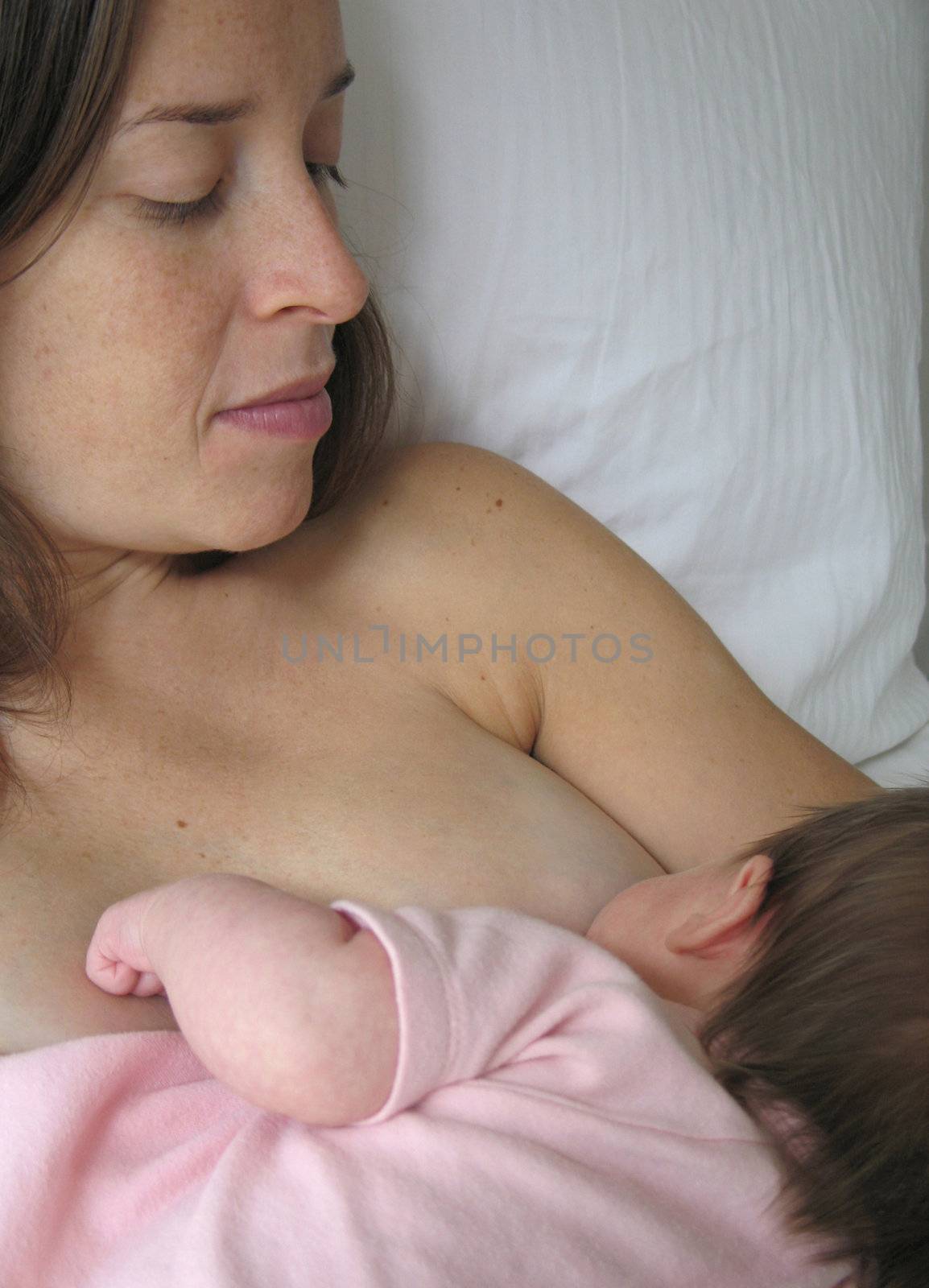 mother breast feeding by mmm
