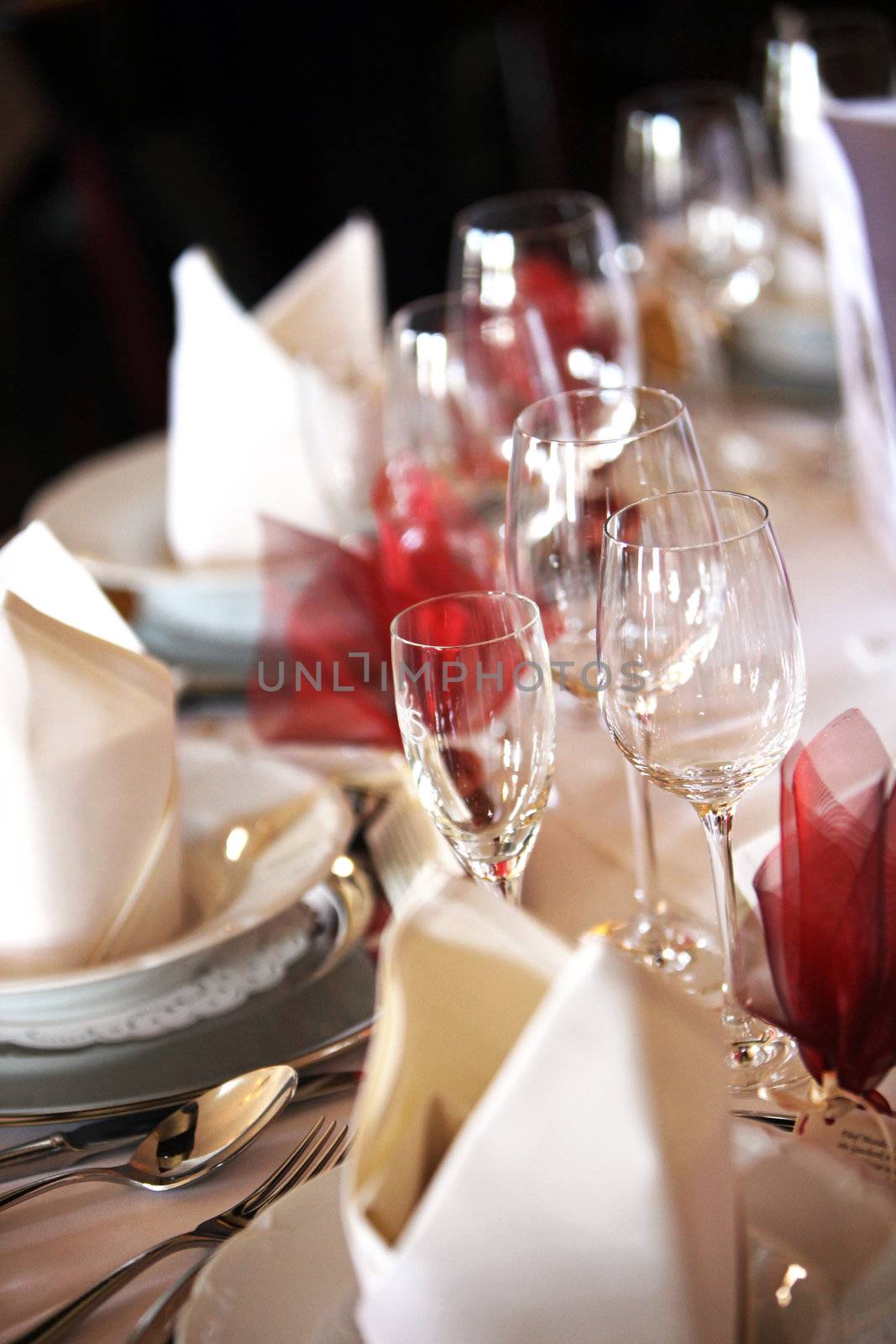 festively decorated table with different glasses