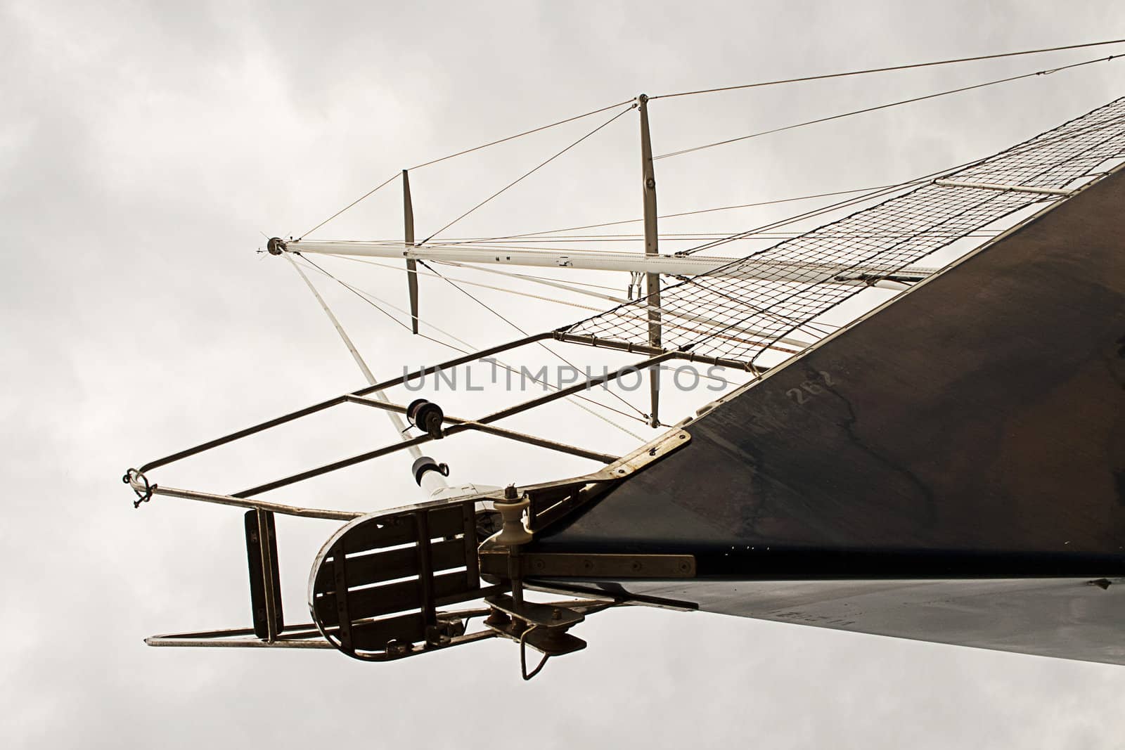 Blue hull sailboat photographed from an original point of wiew