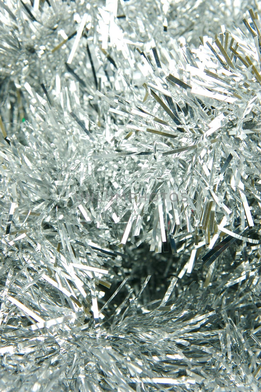 Christmas ornaments isolated on a tinsel