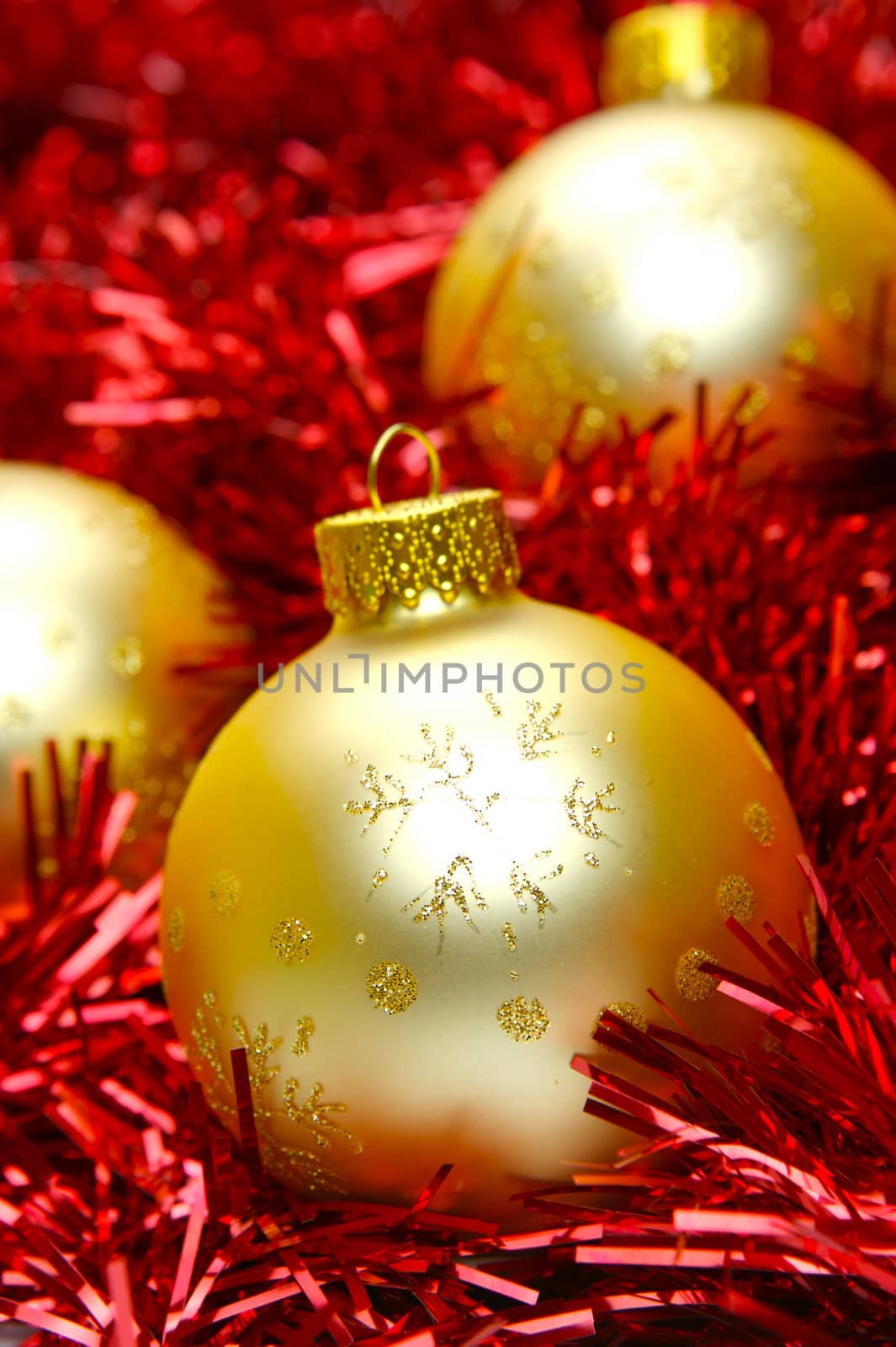 Christmas ornaments isolated on a tinsel