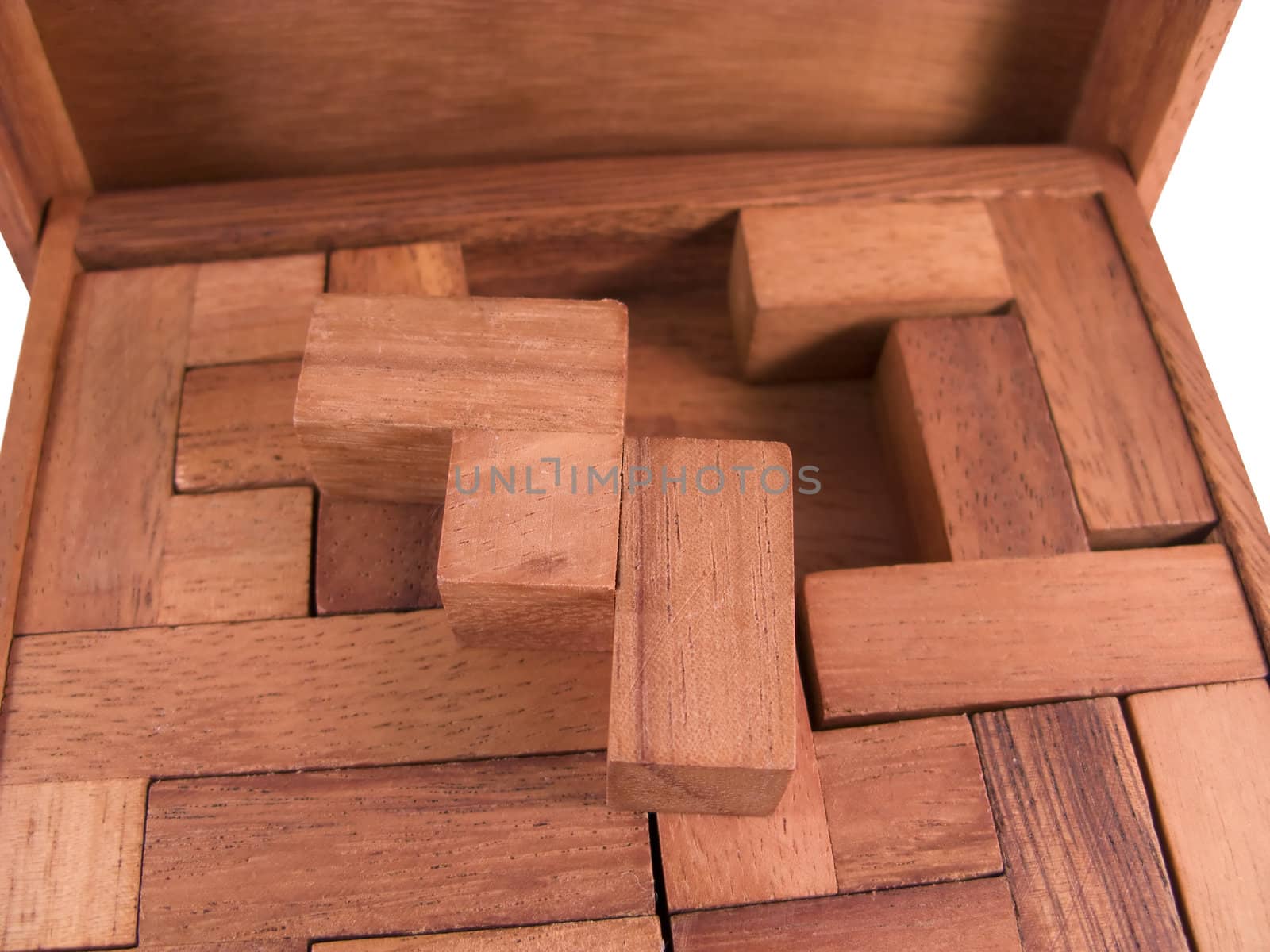 Wooden block puzzle isolated on white