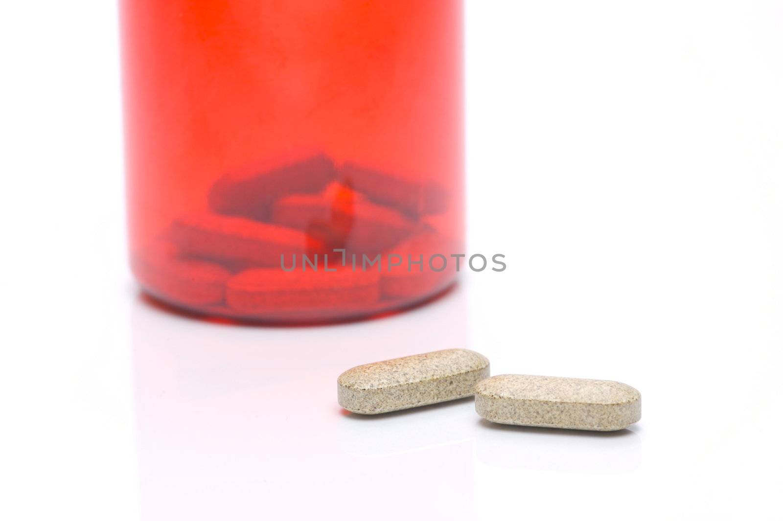 Prescription tablets isolated against a white background