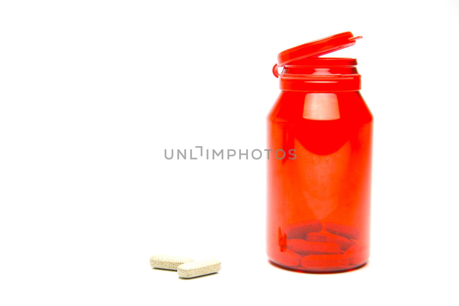 Prescription tablets isolated against a white background