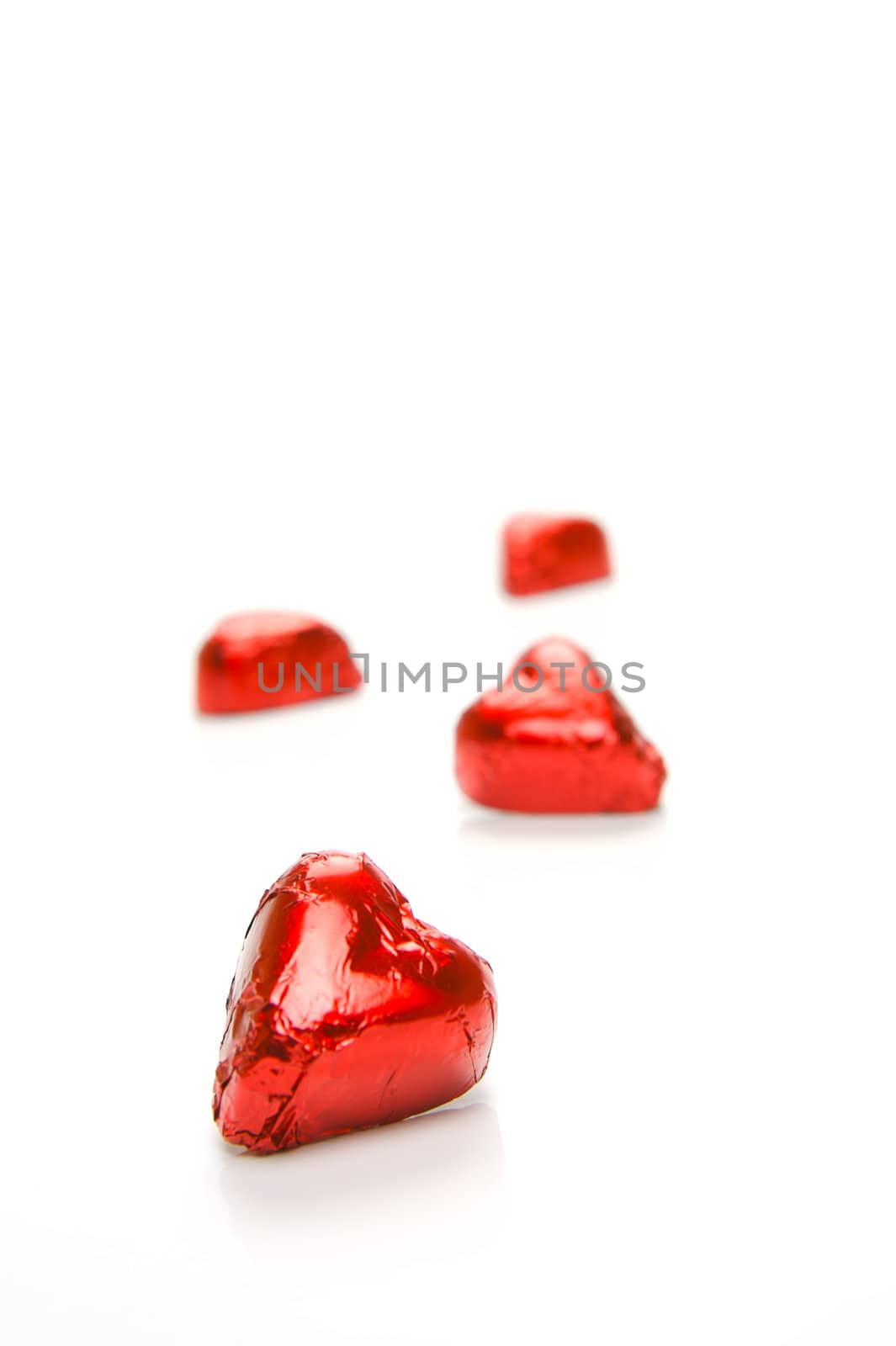 Chocolate love hearts isolated against a white background