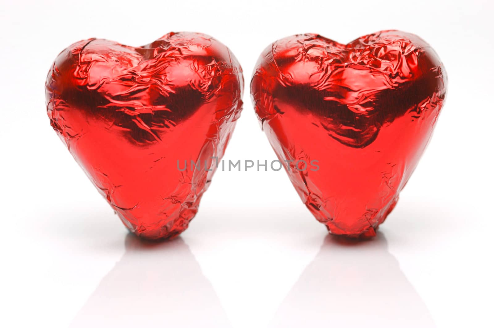 Chocolate love hearts isolated against a white background