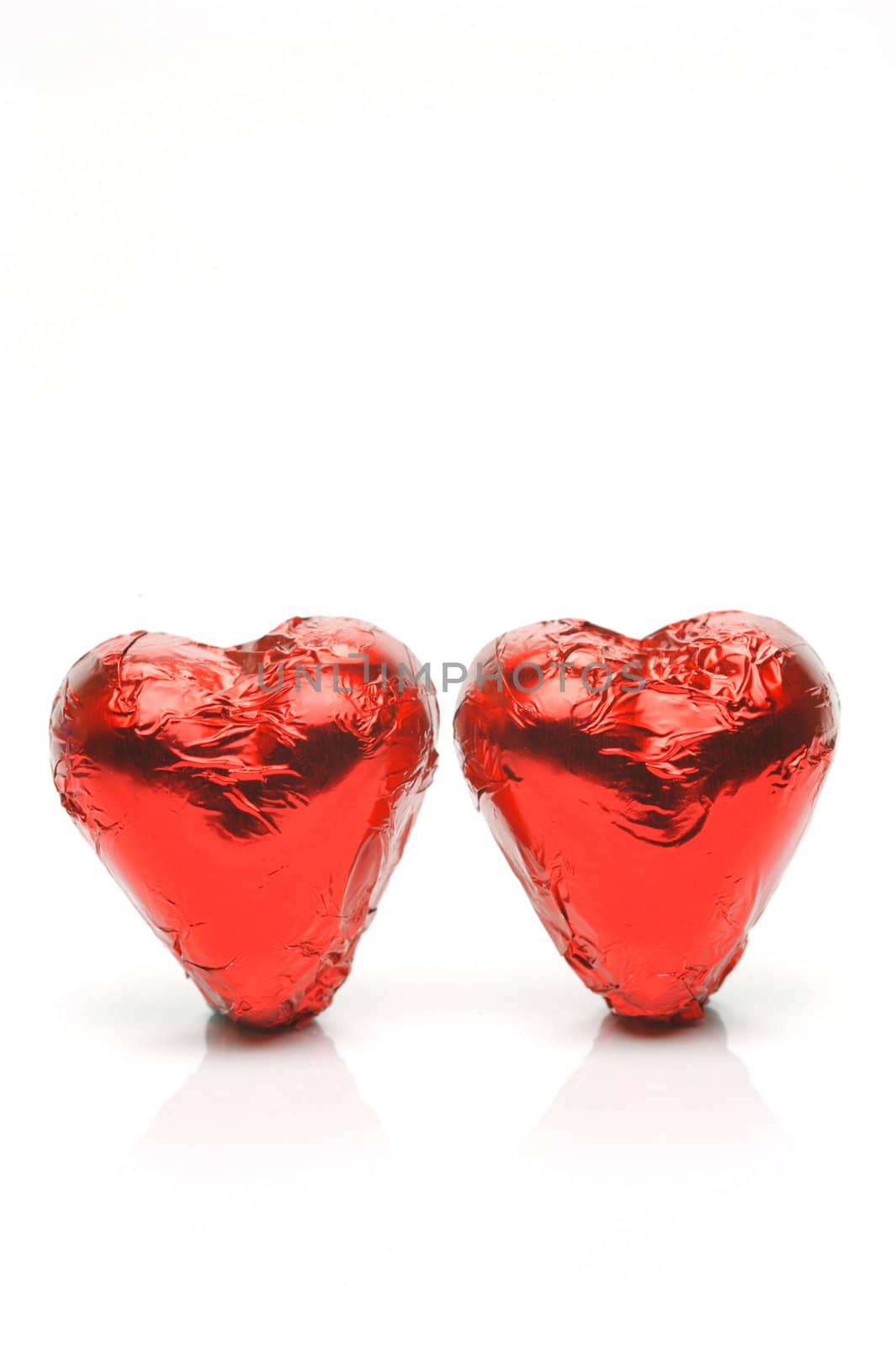 Chocolate love hearts isolated against a white background