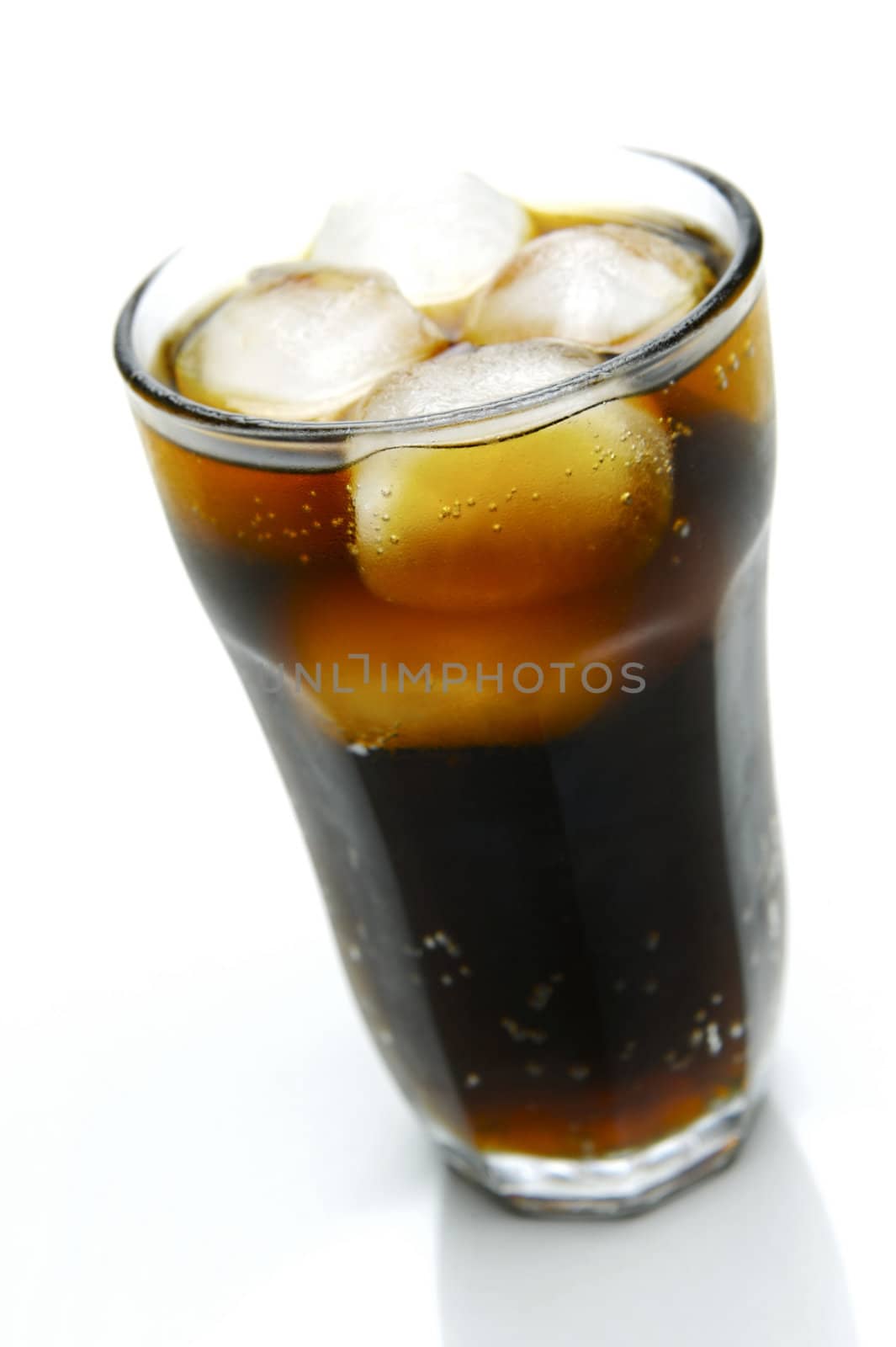 A glass of cola isolated on white