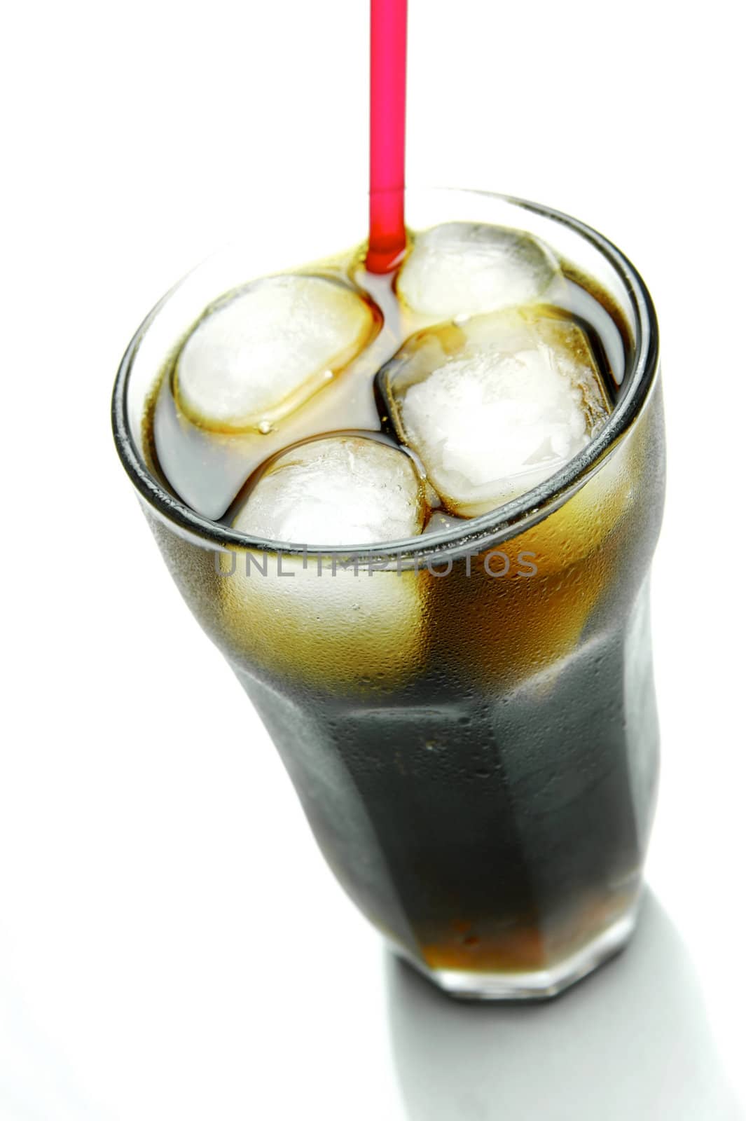 A glass of cola isolated on white