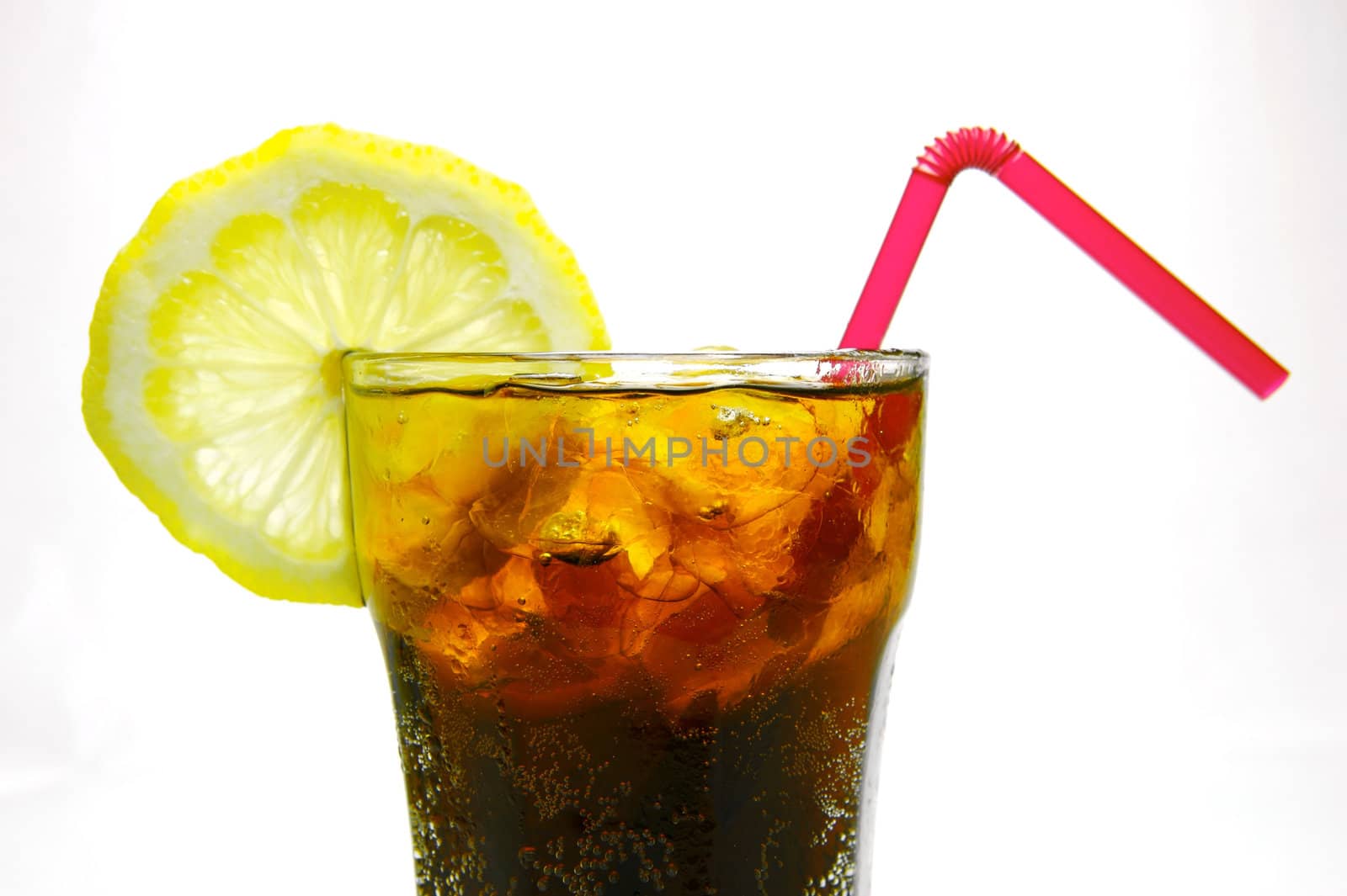 A glass of lemon cola isolated against a white background