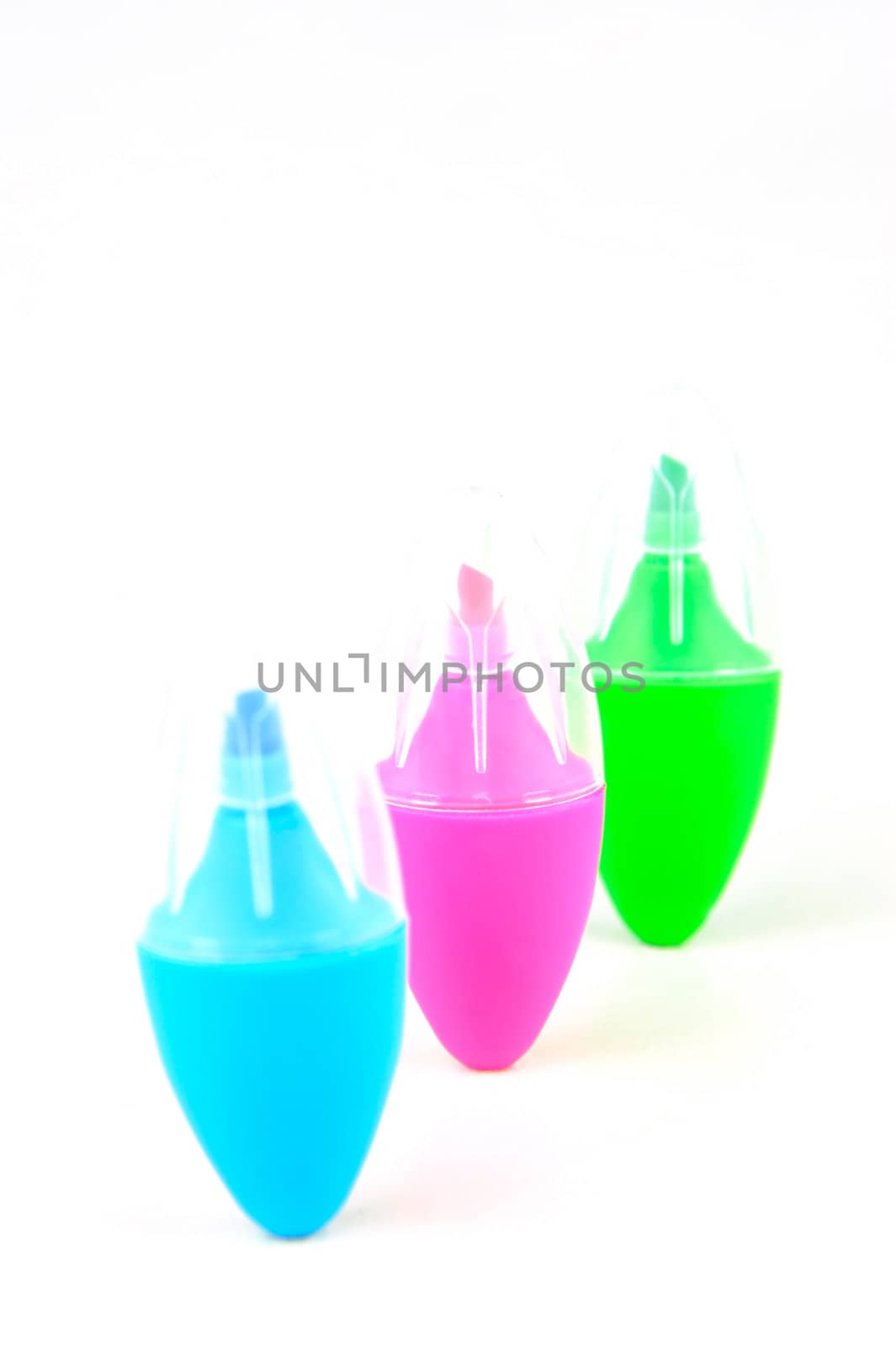 Mini highlighers isolated against a white background