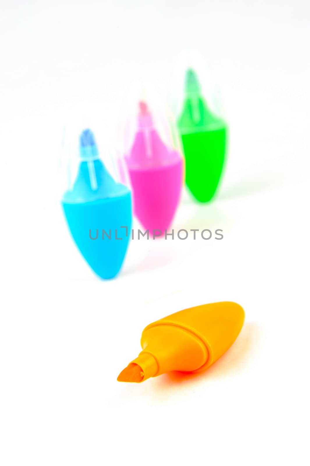 Mini highlighers isolated against a white background