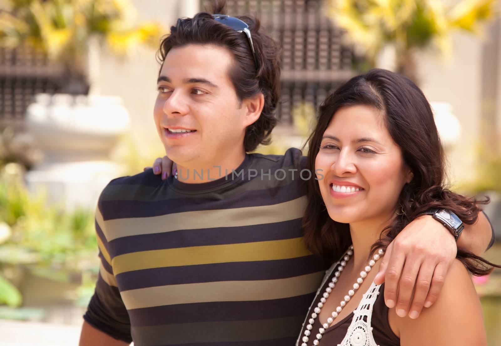 Attractive Hispanic Couple At The Park by Feverpitched