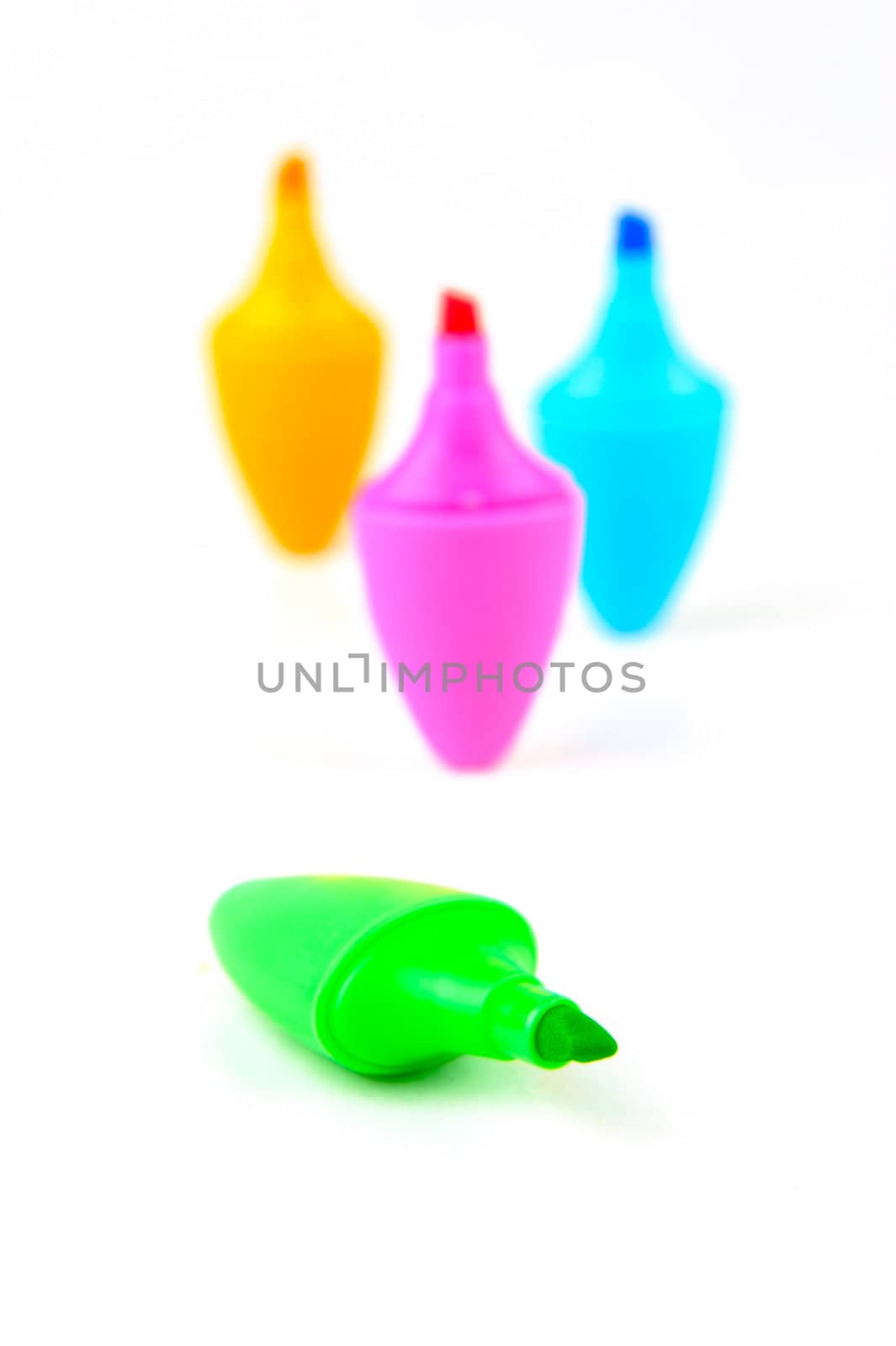 Mini highlighers isolated against a white background