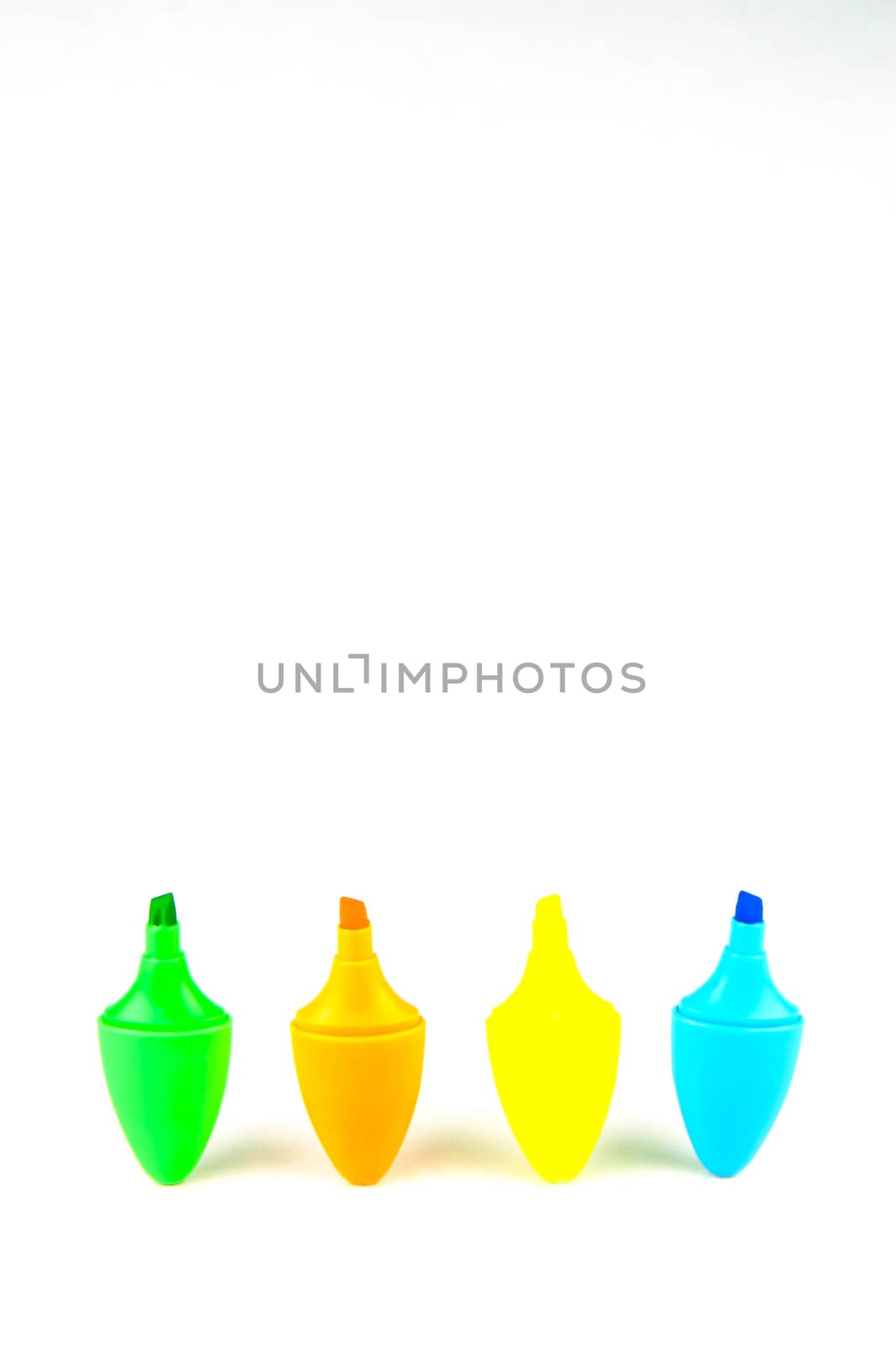 Mini highlighers isolated against a white background